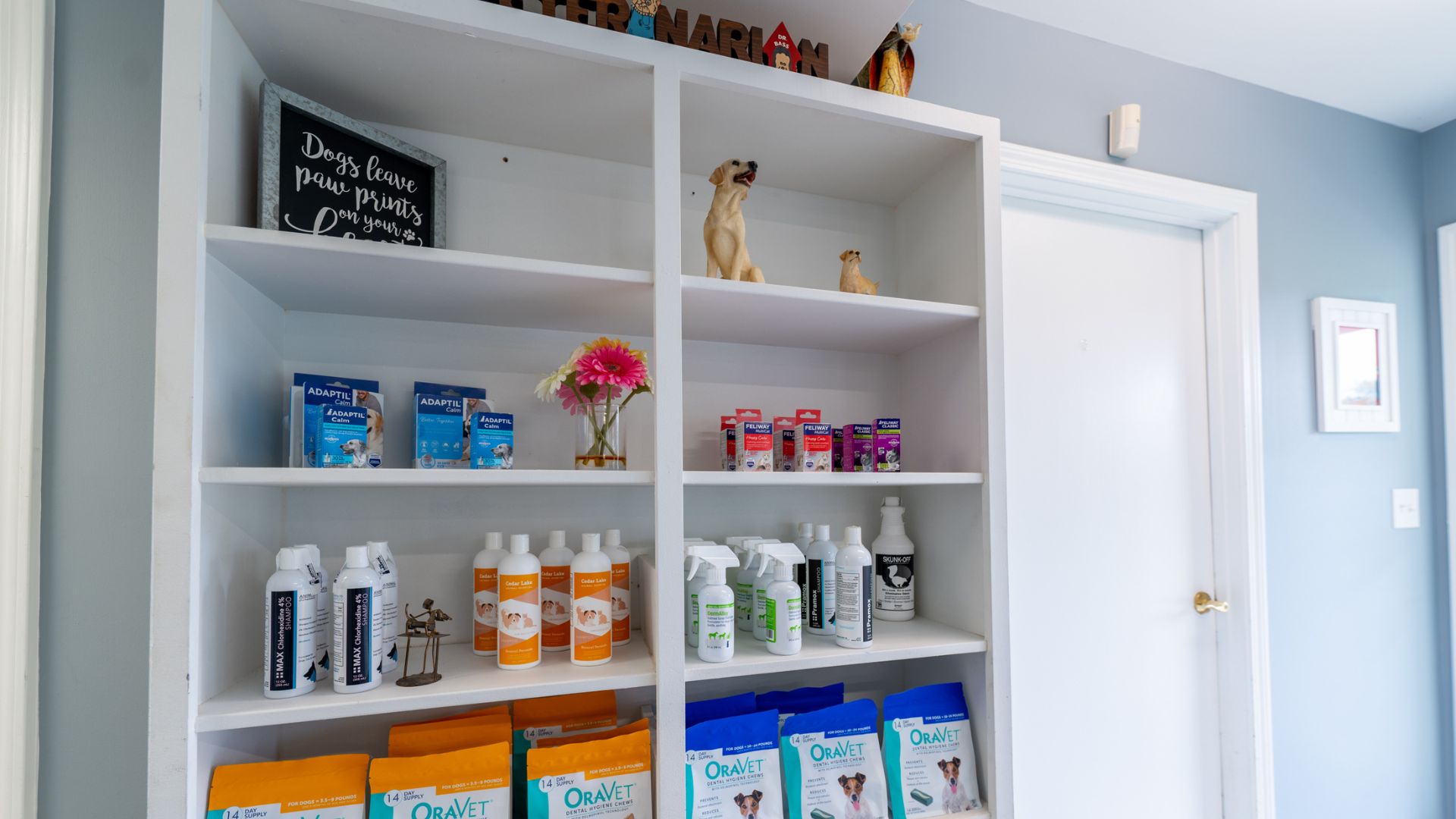 a white shelf filled with lots of different types of products